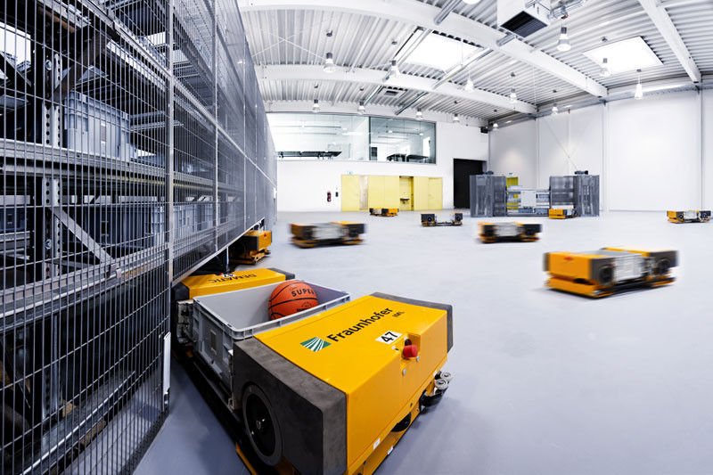 A swarm of autonomous robots, invented by Fraunhofer IML